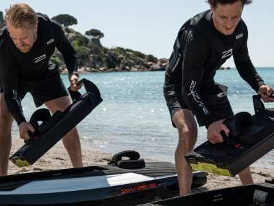 Awake Click-to-Ride system showing battery being inserted into jetboard